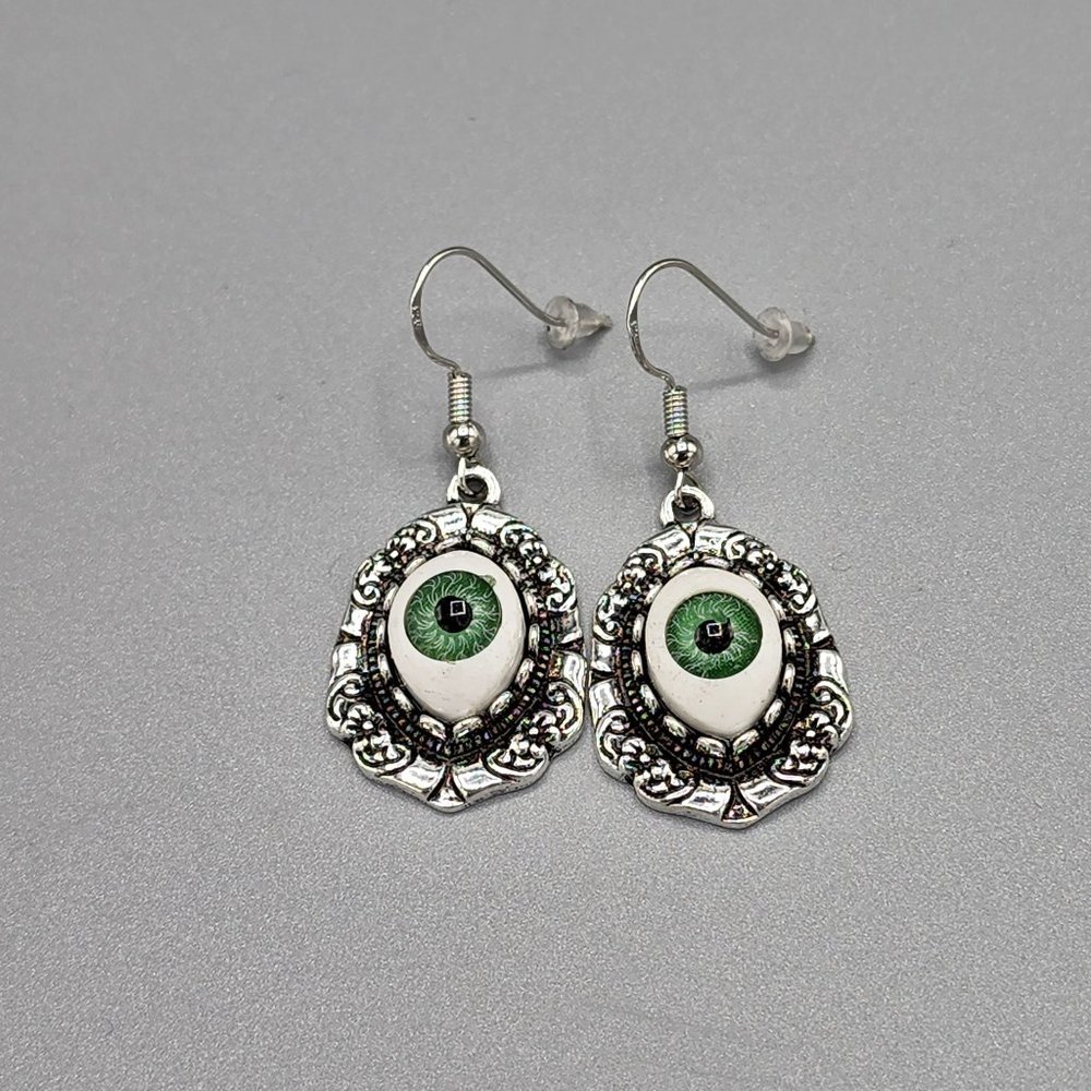 Decorative framed green evil Eye Dangle Earrings with silver tone Outer Decor - Picture 2 of 4